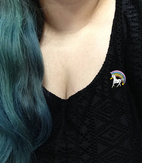 Duckiecorn pin worn on a shirt