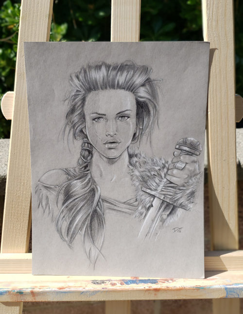 Black and white drawing of a woman holding a sword on grey paper
