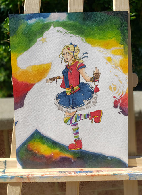 Photo of the Rainbow Punk painting on an easel.